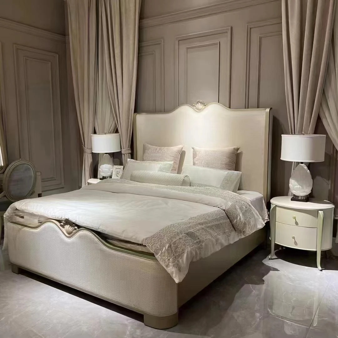 elegant white upholstered bed with decorative pillows
